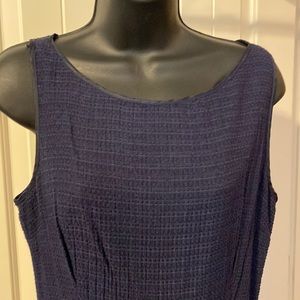 Navy fit and flare sleeveless dress with tan belt